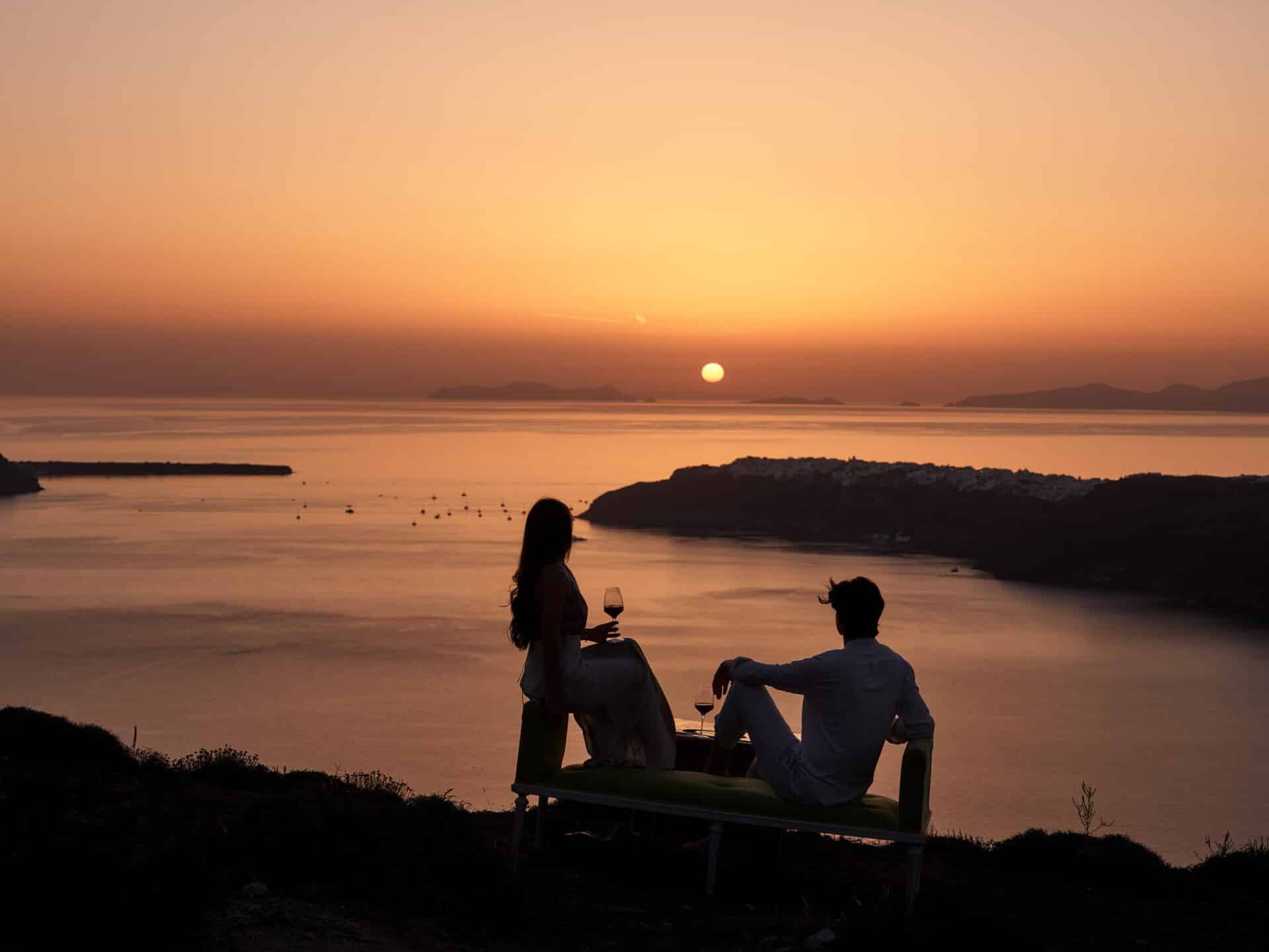 Dining at the best Santorini restaurants with sunset view