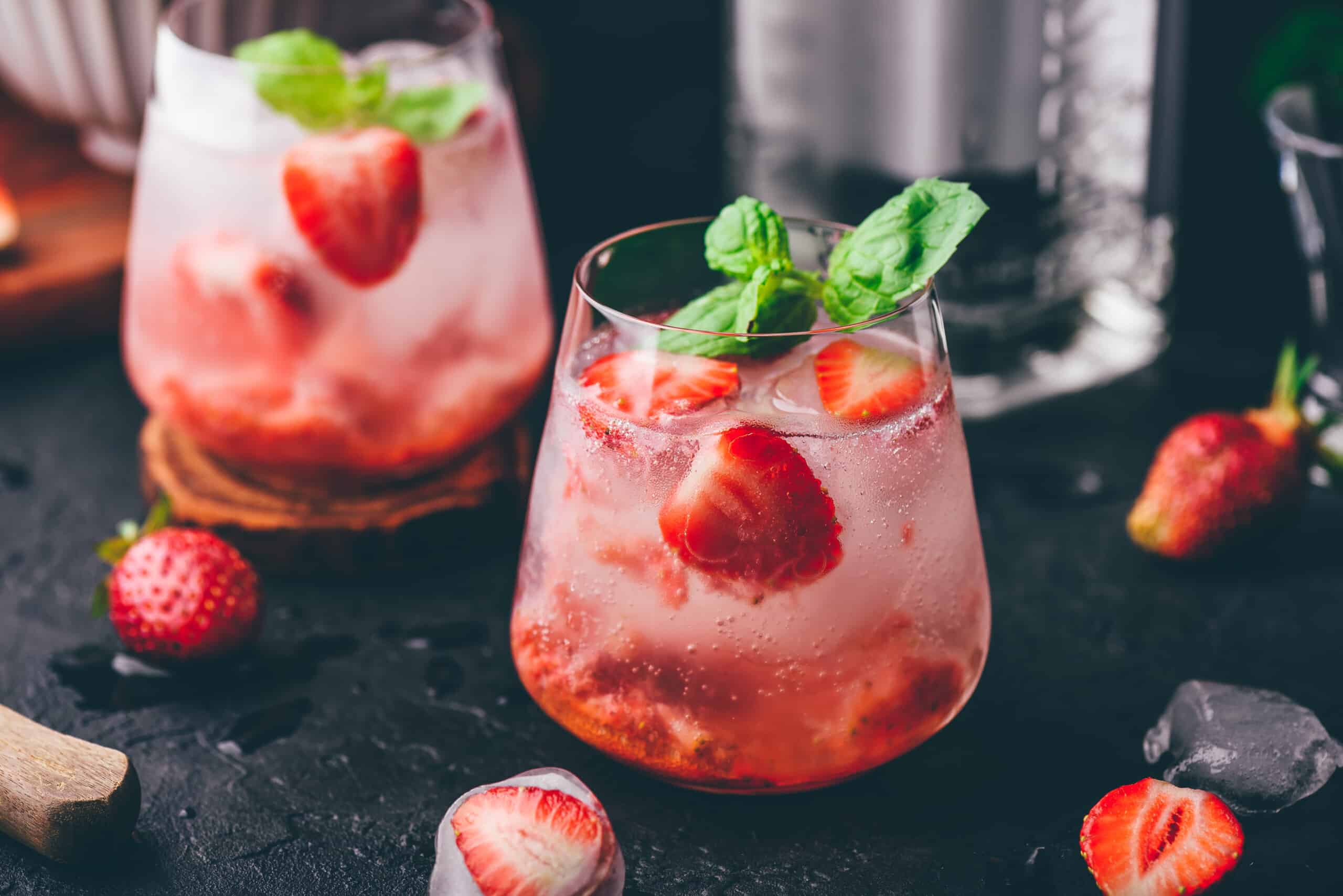 Two,Glasses,Of,Cocktail,With,Fresh,And,Frozen,Strawberry,,Gin