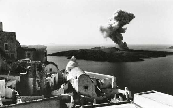 Panoramic photo with smokes coming out of Santorini Volacno as it is erupting in 1956